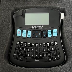 DYMO LabelManager 210D label maker with case and three label refills.